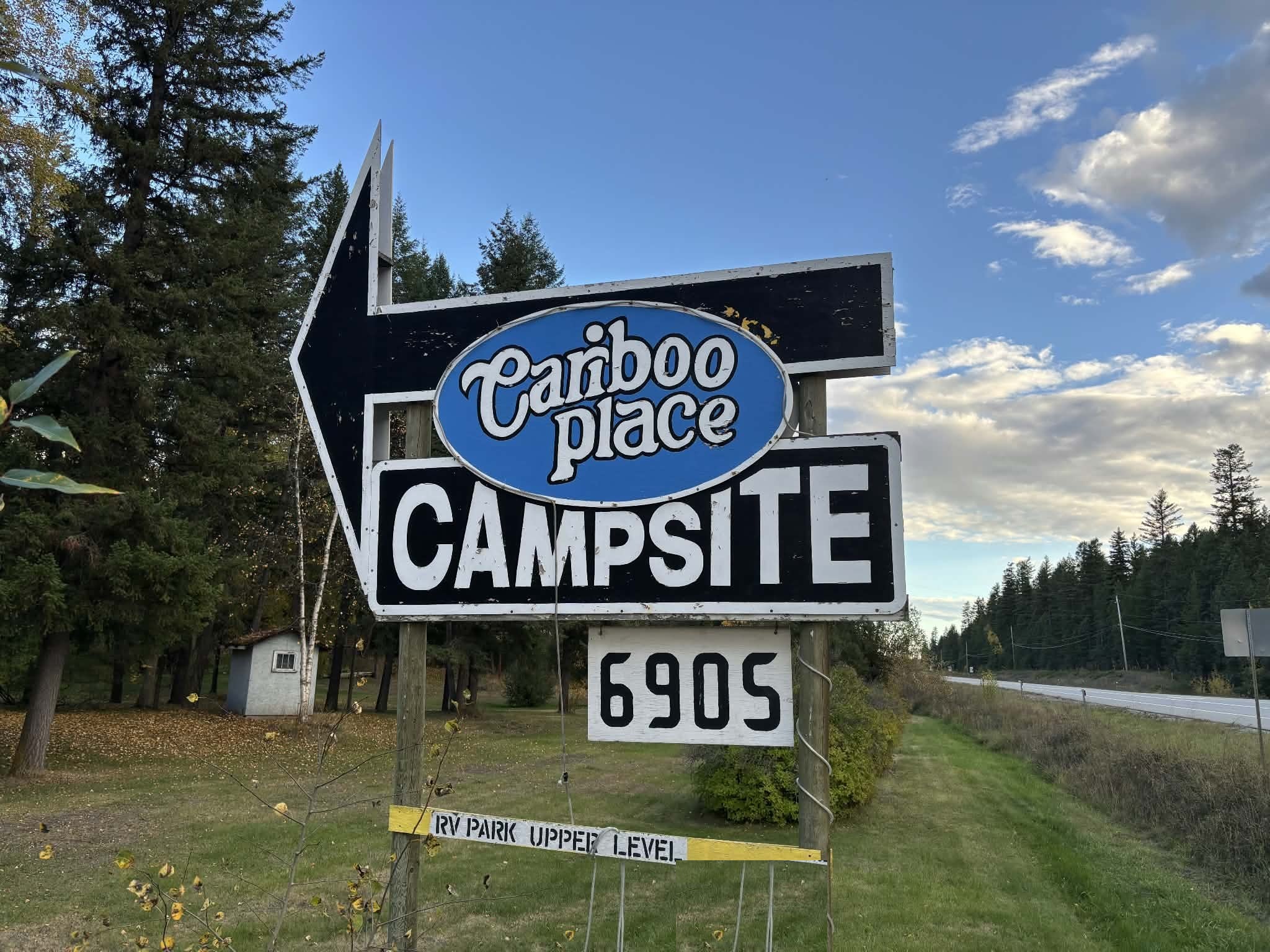 Highway 97 entrance sign for Cariboo Place Campsite near Quesnel